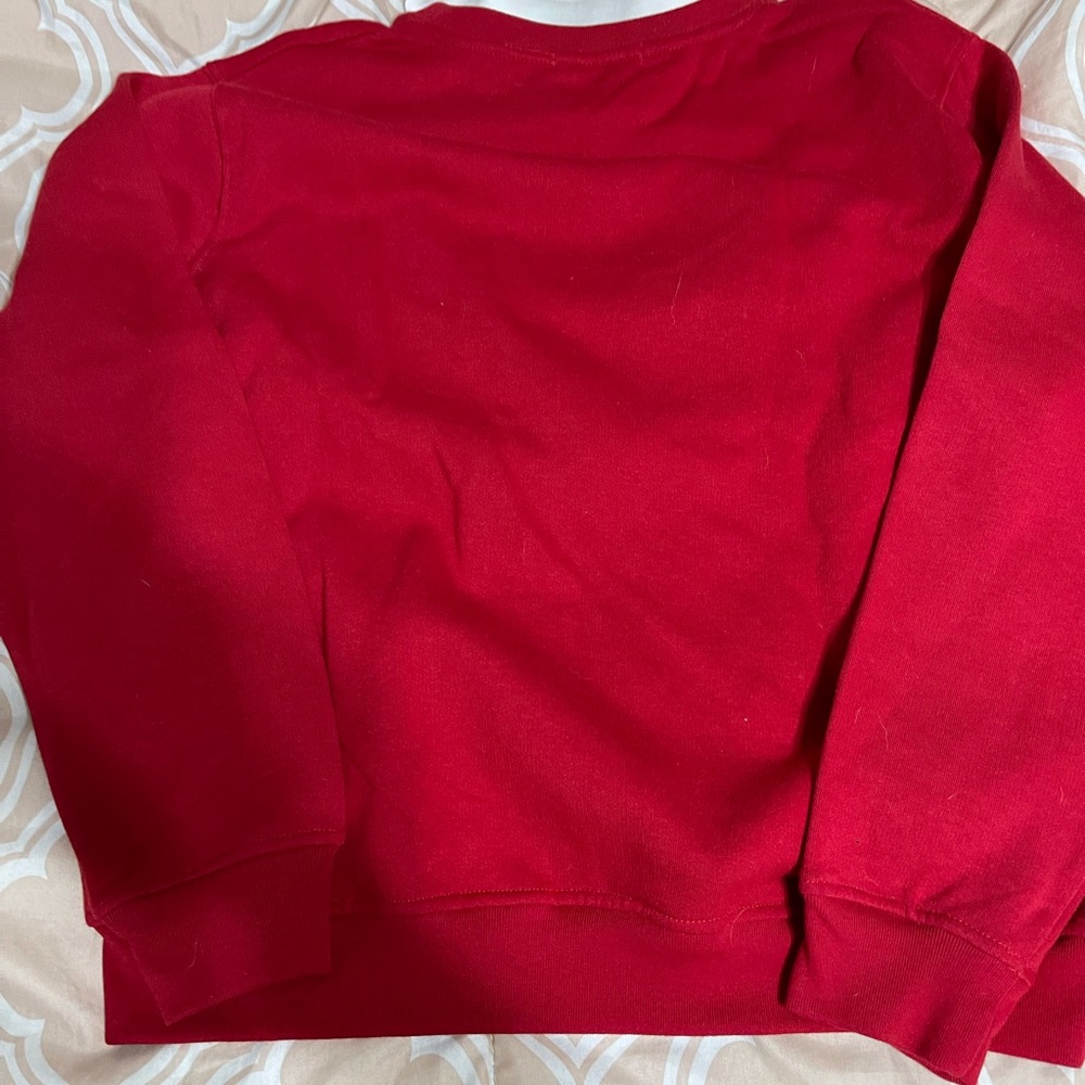 Blusa manga larga , con una manchita en el cuello
